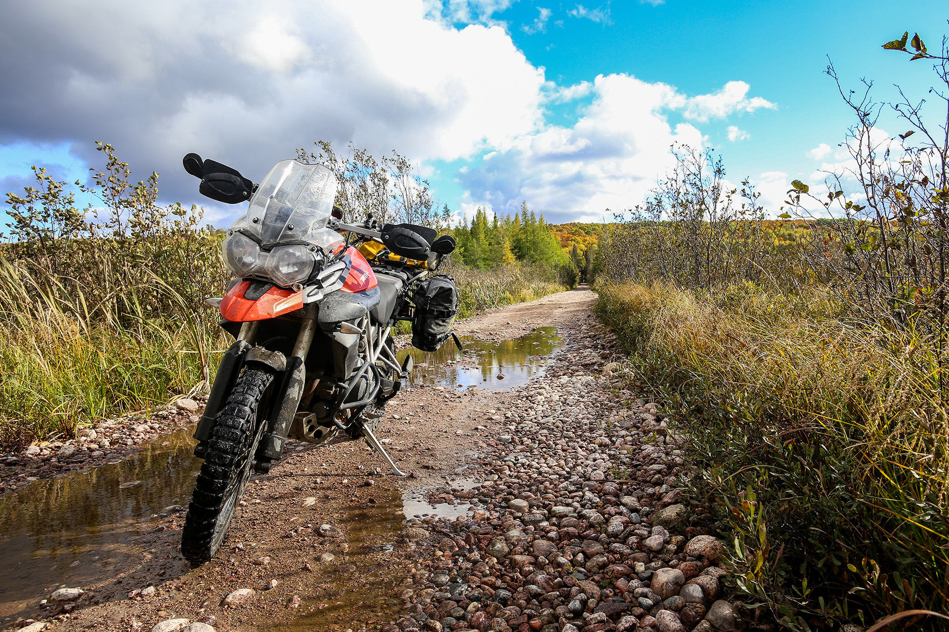 An ADV motorcycle stuck in the mud