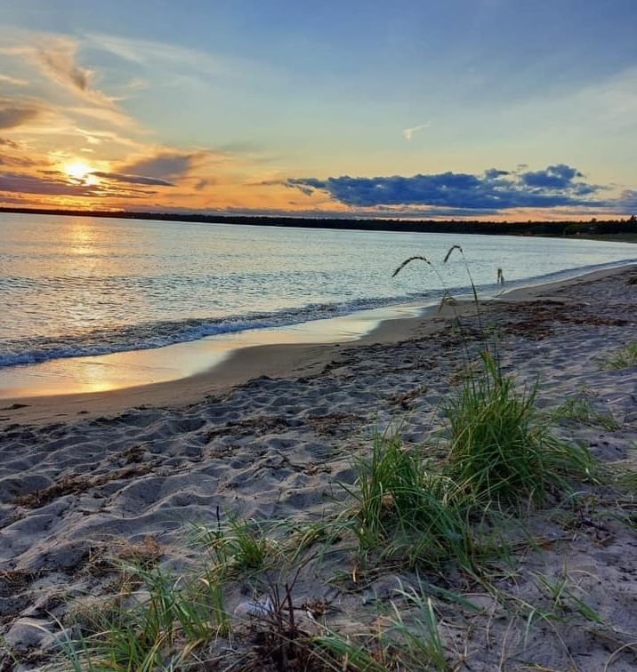 Providence Bay Beach on Manitoulin Island at sunset.