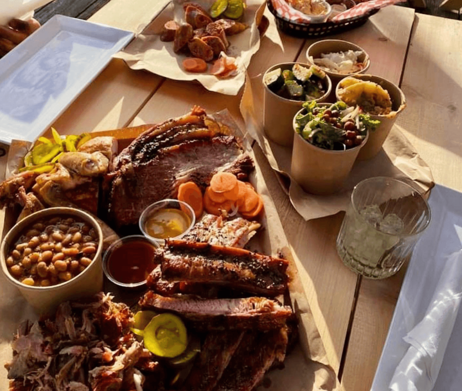 Food and drink on a picnic table at the Outfitter bar in Temagami