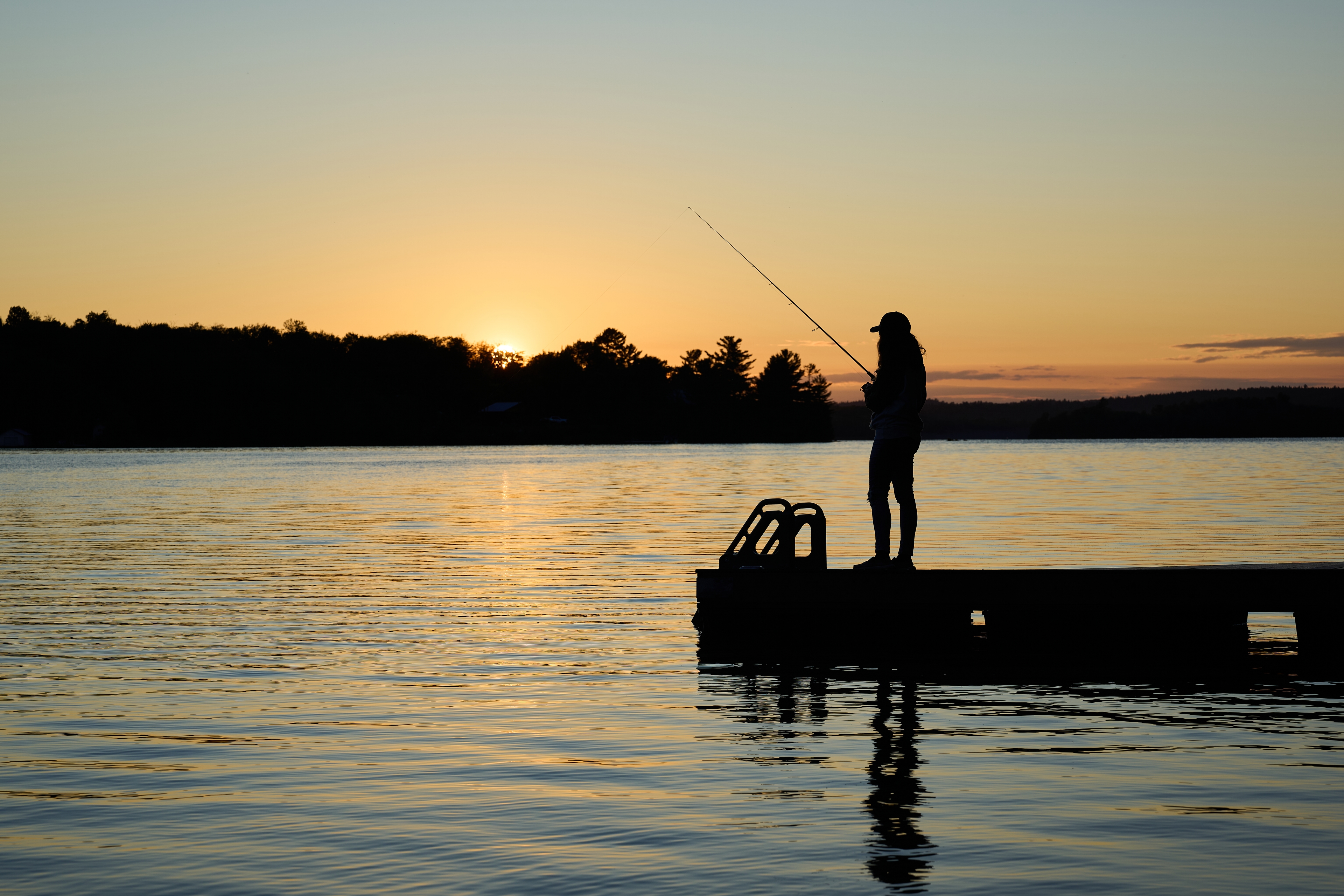 The Zen Master fishing off the dock at sunset