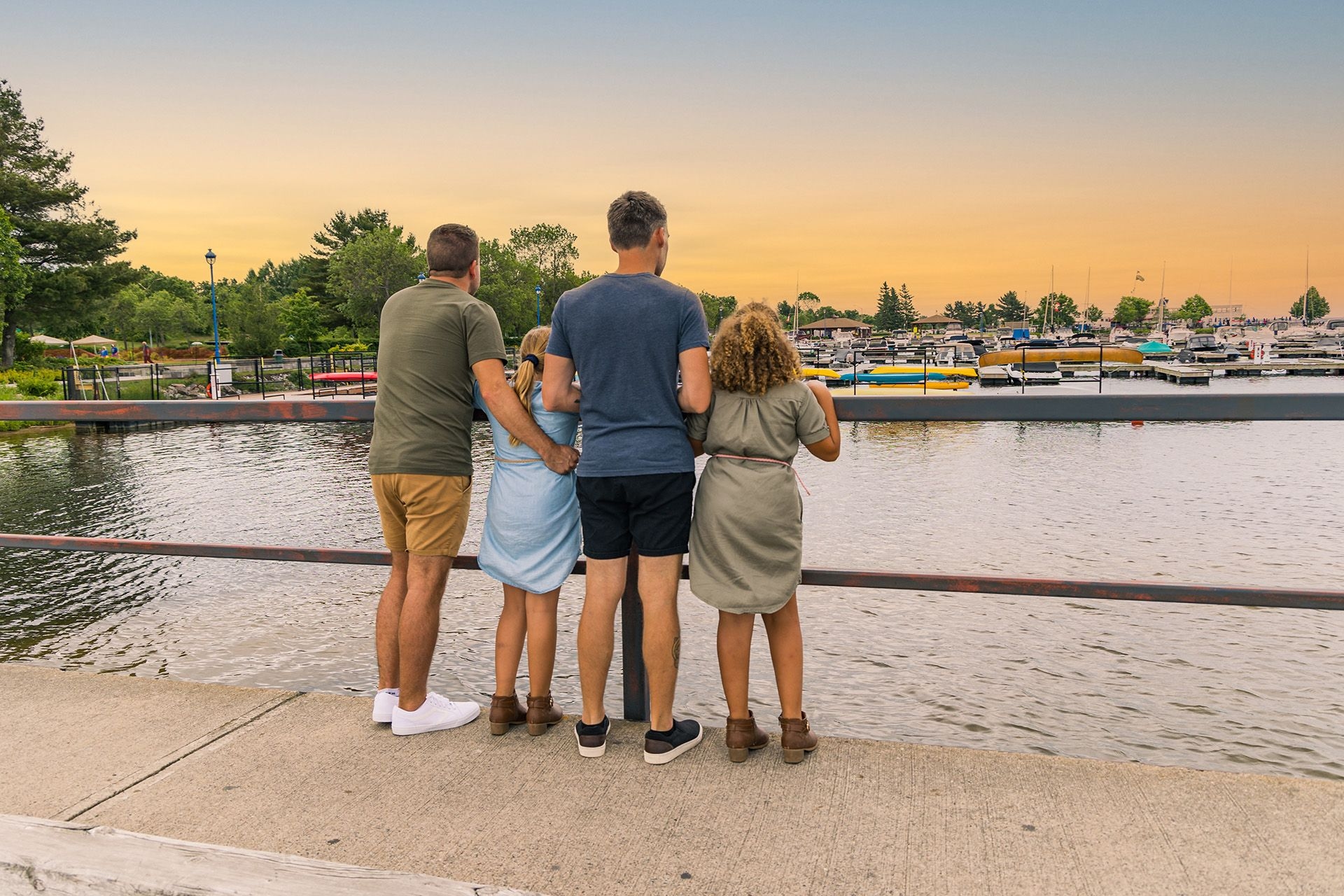 A family looks out over Lake Nipissing at North Bay.